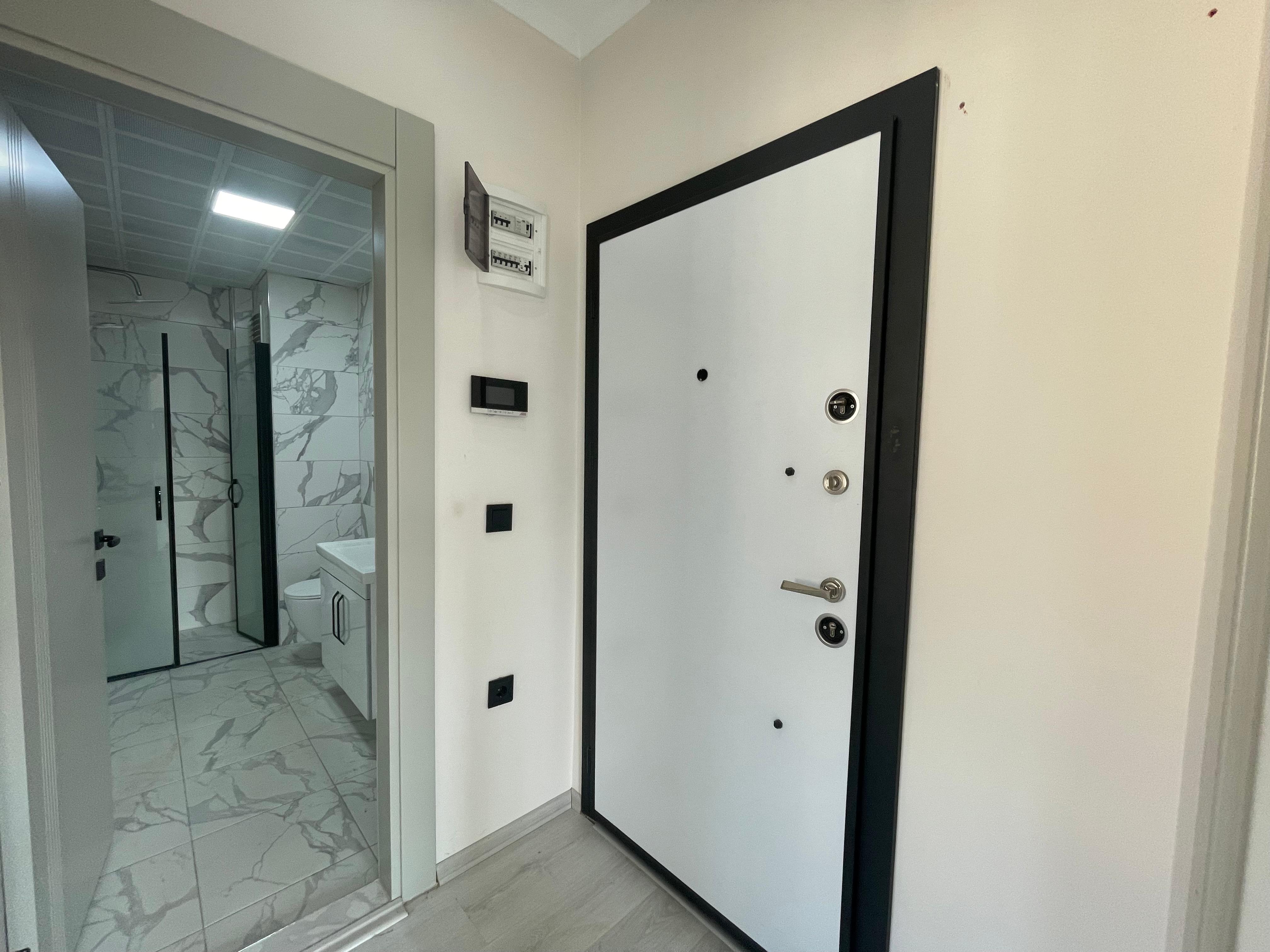 Фото объекта: Купить квартиру 1+1 в Оба, Аланья — ZEYTİN EVLERİ, 55 м², Оба (15)