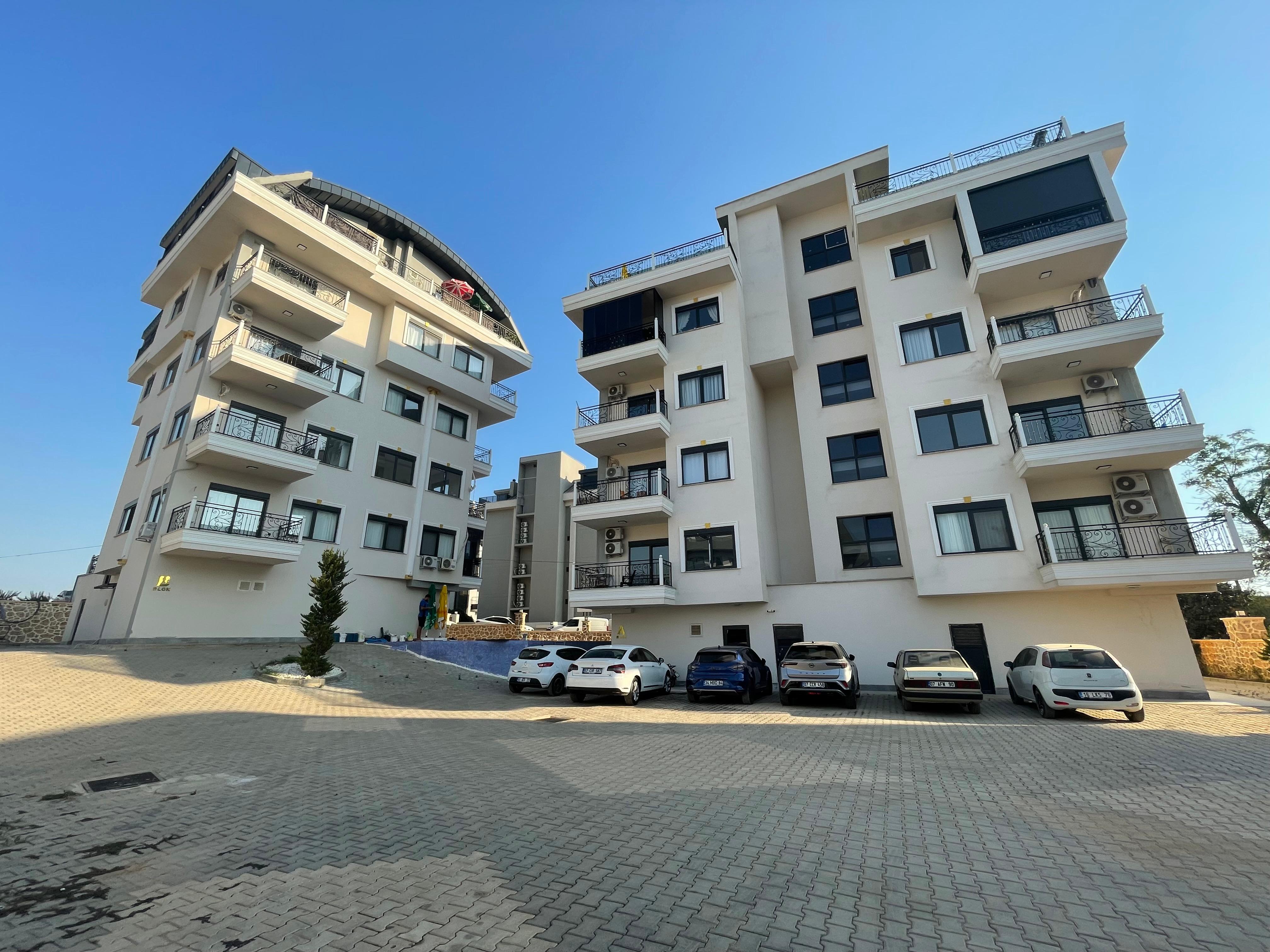Фото объекта: Купить квартиру 1+1 в Оба, Аланья — ZEYTİN EVLERİ, 55 м², Оба (11)