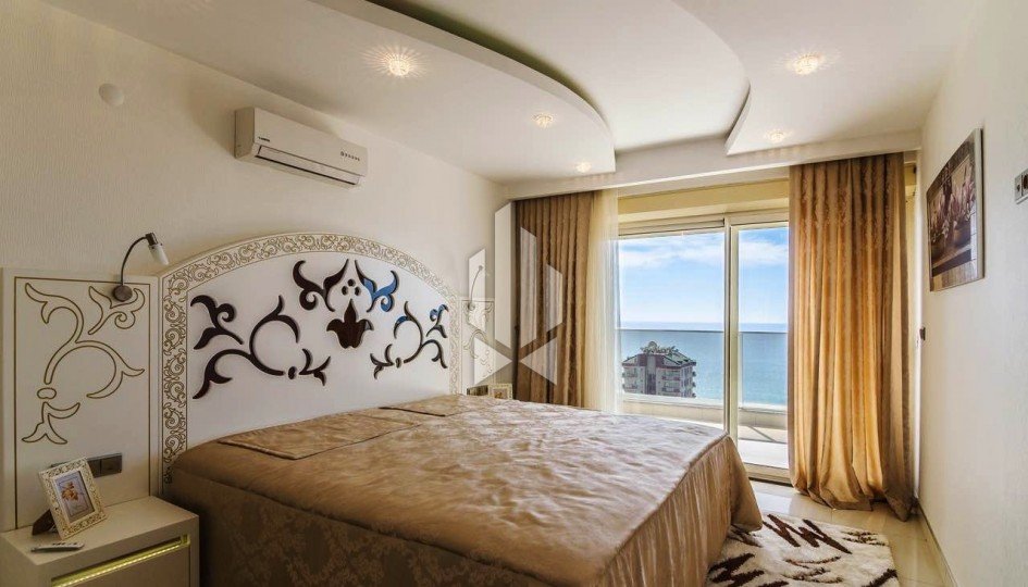 Двухуровневая квартира с двумя спальнями в комплексе на берегу моря, Махмутлар 14