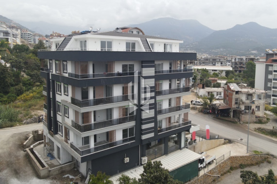 Просторные апартаменты в построенном комплексе среди гор