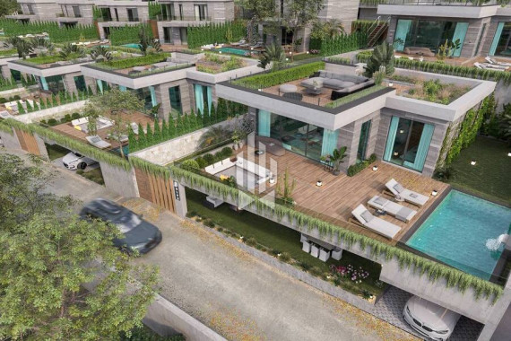 Элитный особняк состоящий из пяти спален и кухни-студии с бассейном и террасой