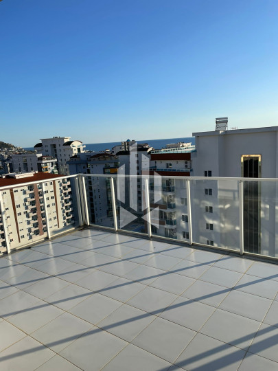 Элегантные двухэтажные апартаменты с конфигурацией 4+1 в Махмутларе. 10