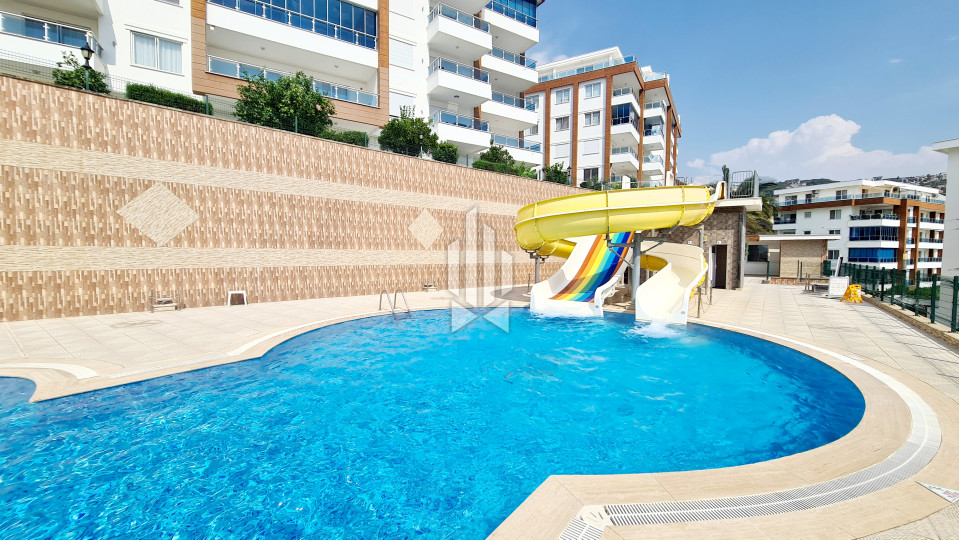 Exclusive Residence with Panoramic View: Spacious 3+1 Apartment with Private Garden in Kargicak Village, Alanya City 11