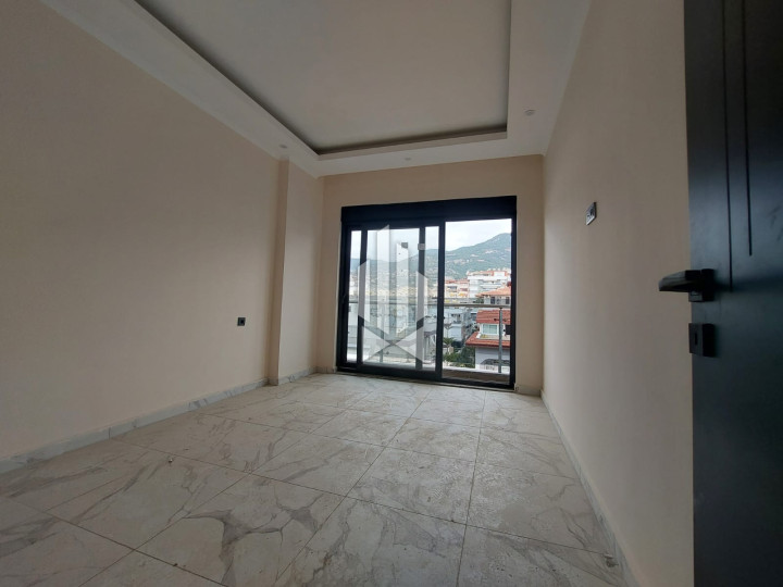 Duplex in the center of Alanya 130 m from the beach in a complex with infrastructure 12