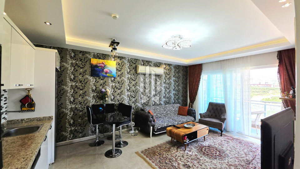 Квартира 2+1 в комплексе с аквагорками в Махмутларе — 500 м до моря! 28