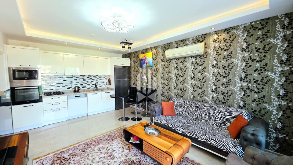 Квартира 2+1 в комплексе с аквагорками в Махмутларе — 500 м до моря! 33