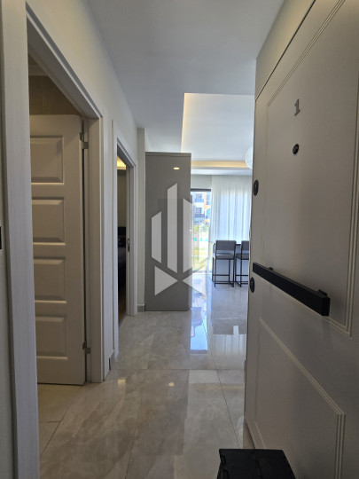 Spaciousness and comfort in a one-room apartment with a kitchen-living room in Gazipasa 9