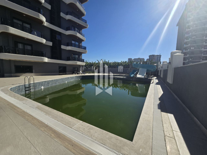 Продажа квартиры 2+1 в комплексе, Махмутлар – всего 500 м до моря! 21