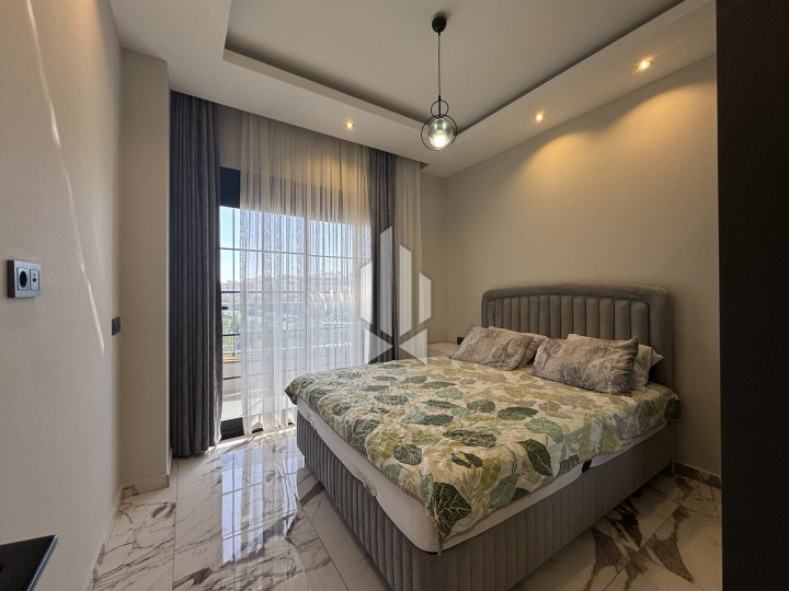 Новая меблированная квартира 1+1, всего 200 м до пляжа 24