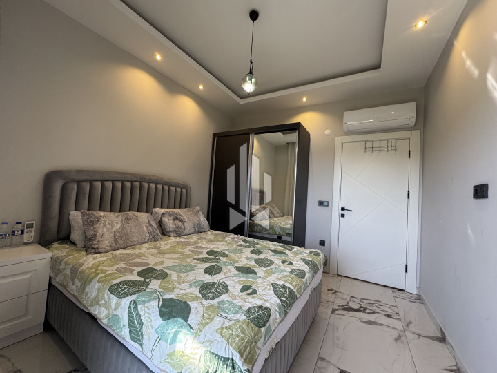 Новая меблированная квартира 1+1, всего 200 м до пляжа 25