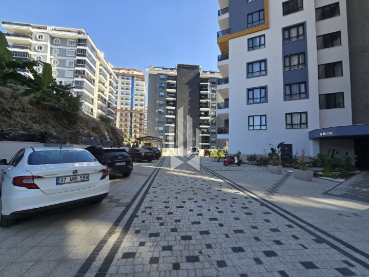 Modern 1+1 apartments in a residential complex with a swimming pool, Mahmutlar 19