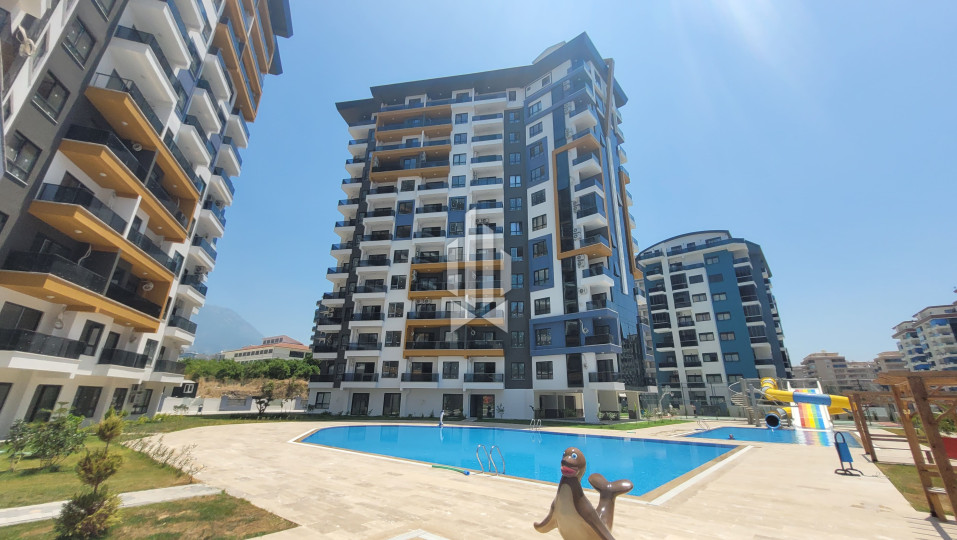 1+1 apartment for rent in a premium class complex, Mahmutlar 13