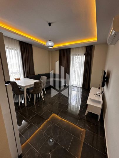 1+1 apartment for rent in a premium class complex, Mahmutlar 3