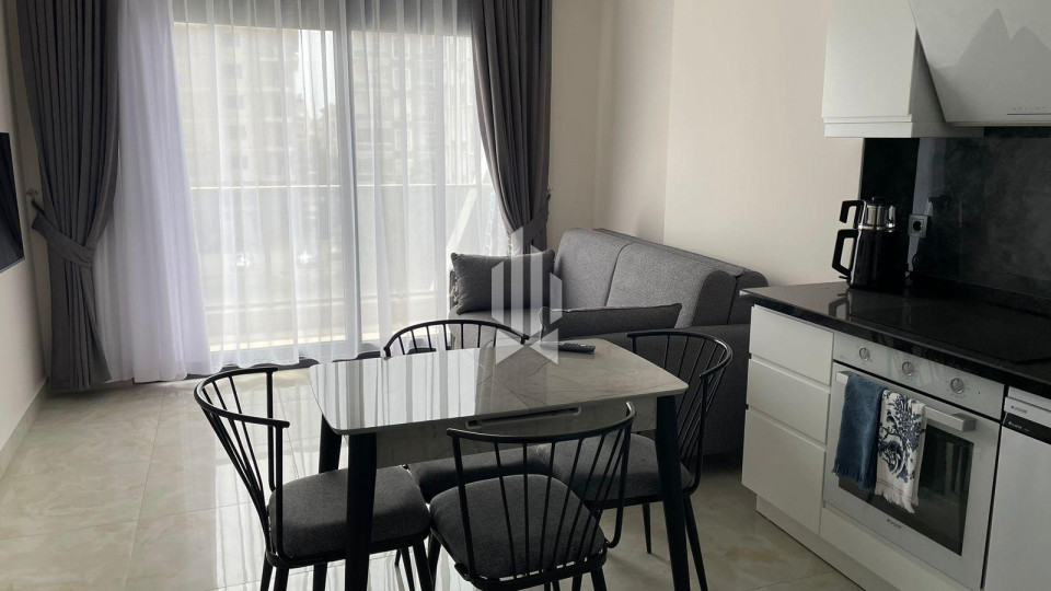 Комфортные апартаменты 1+1 для аренды в популярном районе Махмутлар 4