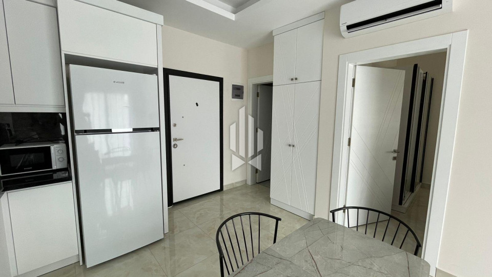 Комфортные апартаменты 1+1 для аренды в популярном районе Махмутлар 10