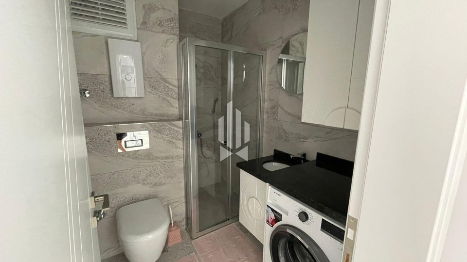 Комфортные апартаменты 1+1 для аренды в популярном районе Махмутлар 12