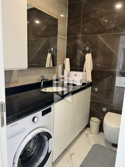 Сдается просторная и стильная квартира 2+1 в одном из лучших премиум-комплексов первой линии в Каргыджаке 8