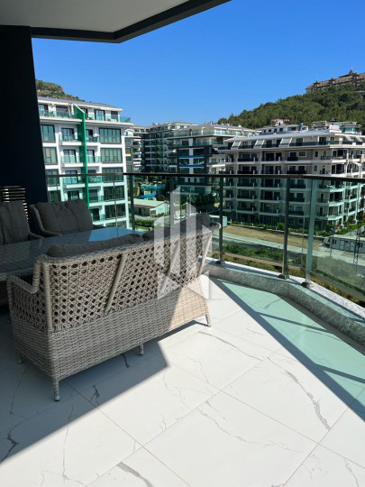 Сдается просторная и стильная квартира 2+1 в одном из лучших премиум-комплексов первой линии в Каргыджаке 9