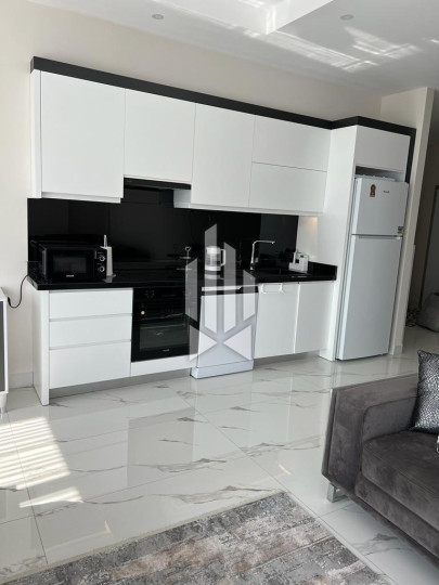 Сдается просторная и стильная квартира 2+1 в одном из лучших премиум-комплексов первой линии в Каргыджаке 13