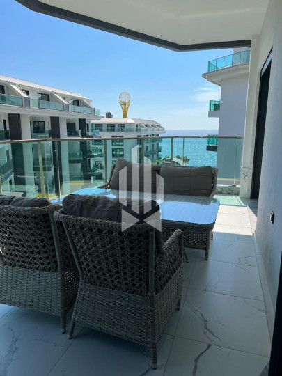 Сдается просторная и стильная квартира 2+1 в одном из лучших премиум-комплексов первой линии в Каргыджаке 14