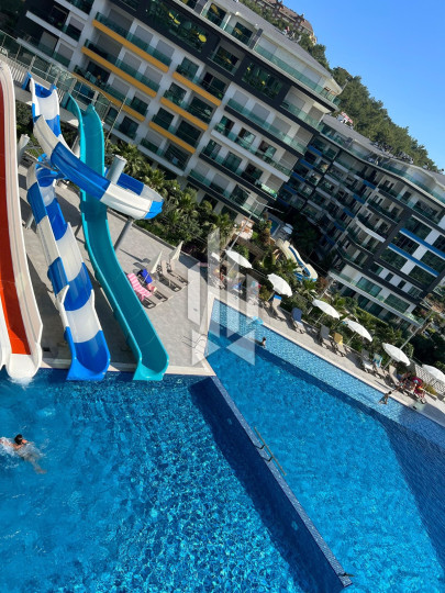 Сдается просторная и стильная квартира 2+1 в одном из лучших премиум-комплексов первой линии в Каргыджаке 18