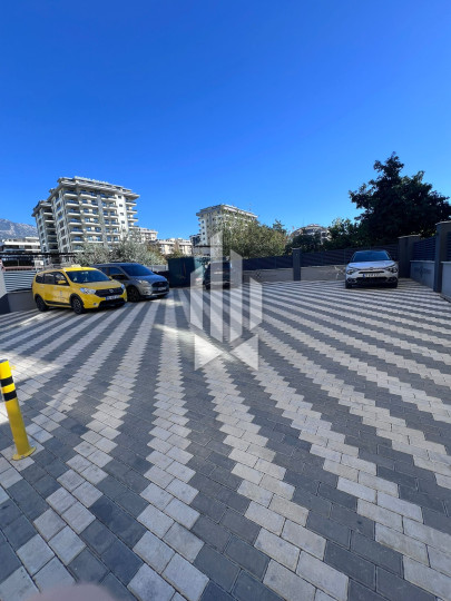 A cozy 1+1 apartment is for rent in a new and well-maintained complex in the Mahmutlar district 3