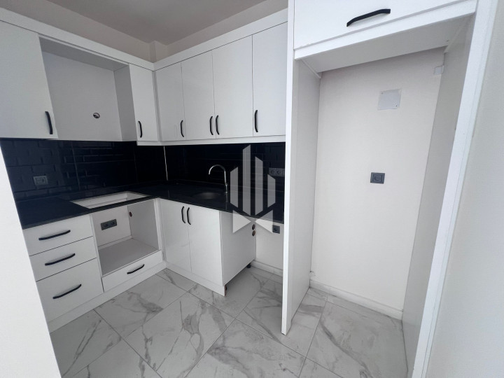 Современная квартира 2+1 в центре Аланьи — новый дом 2025 года 21