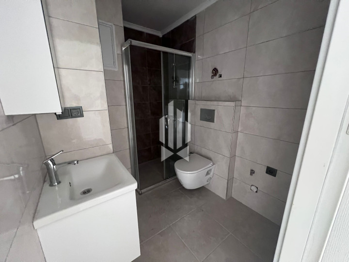 Современная квартира 2+1 в центре Аланьи — новый дом 2025 года 27