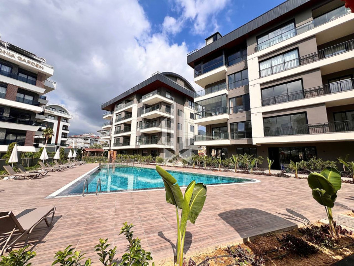 Новая квартира 1+1 в современном жилом комплексе, район Оба 4