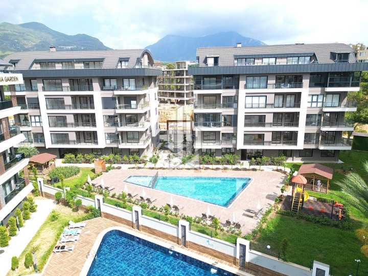 Новая квартира 1+1 в современном жилом комплексе, район Оба 7