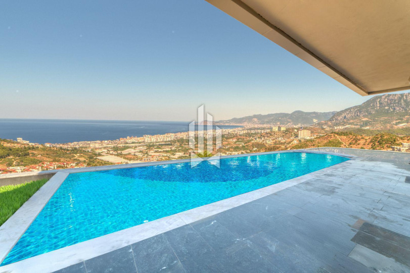 Luxury 4+1 villa with panoramic views of the sea and fortress in Kargicak 45