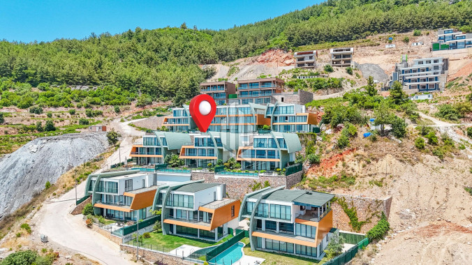 Дуплекс-вилла 5+1 с панорамным видом на море и крепость в районе Тепе