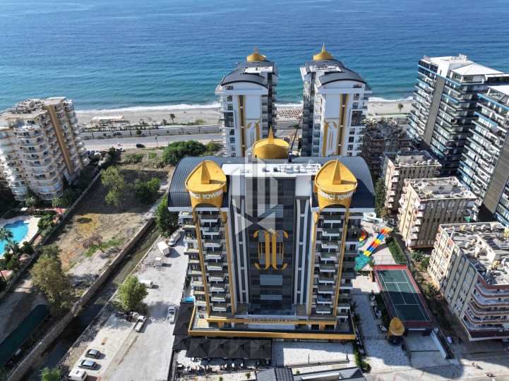 Апартаменты 1+1 на первой береговой линии в Махмутларе 1