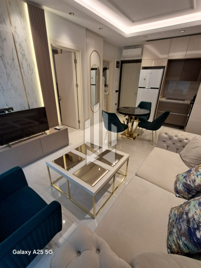 Апартаменты 1+1 на первой береговой линии в Махмутларе 10