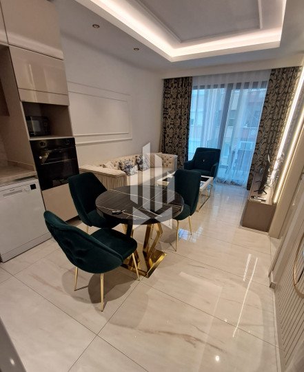 Апартаменты 1+1 на первой береговой линии в Махмутларе 13