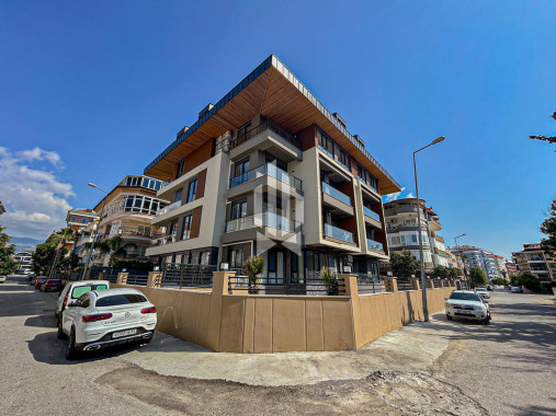 ПРОДАЁТСЯ ПРОСТОРНАЯ КВАРТИРА 2+1 С СОБСТВЕННЫМ САДОМ В OBA GÖL (АЛАНЬЯ)