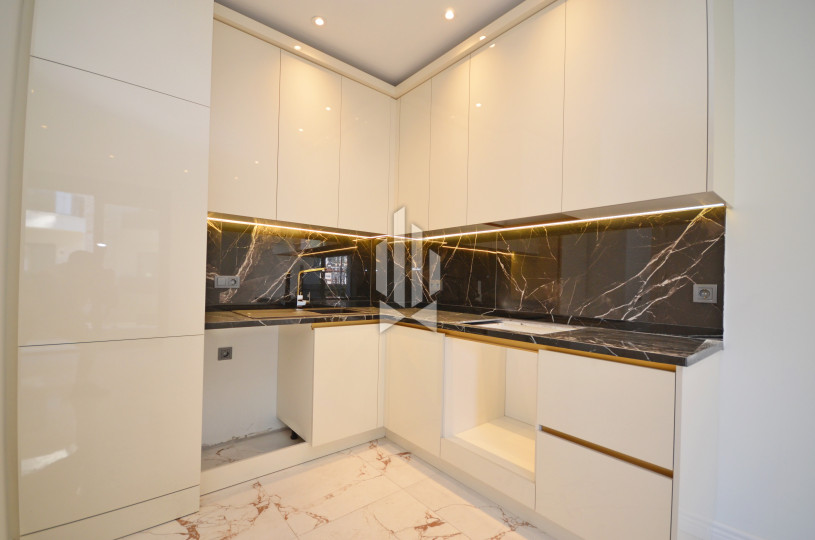 ПРОДАЁТСЯ НОВАЯ КВАРТИРА 1+1 С ВИДОМ НА БАССЕЙН В РАЙОНЕ OBA (АЛАНЬЯ) 10