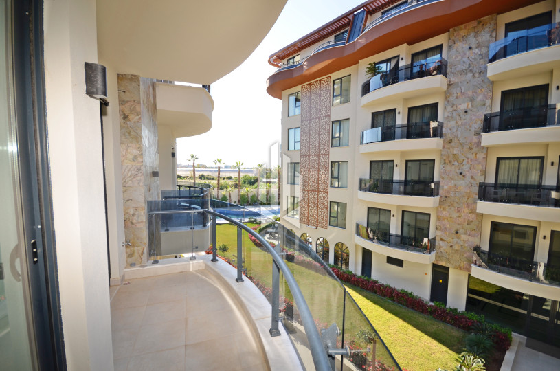 ПРОДАЁТСЯ НОВАЯ КВАРТИРА 1+1 С ВИДОМ НА БАССЕЙН В РАЙОНЕ OBA (АЛАНЬЯ) 11