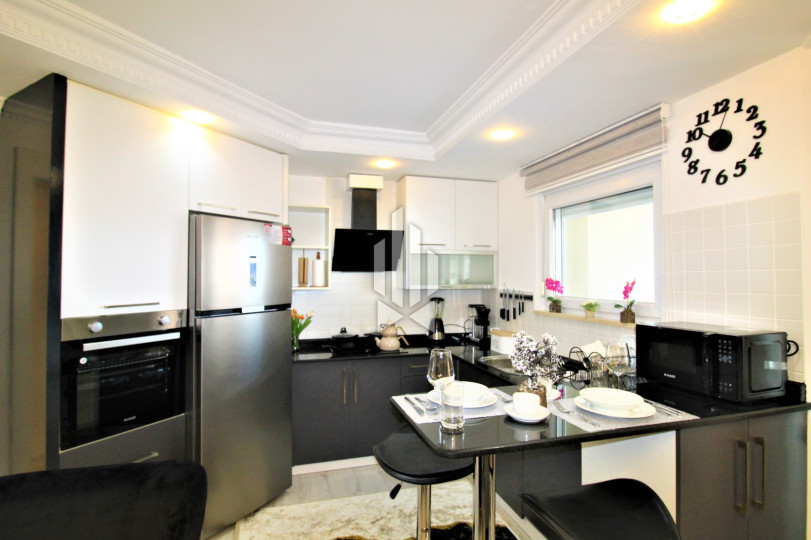 Квартира 2+1 с видом на море и крепость в Джикджилли — 100 м², мебель, ВНЖ подходит 11